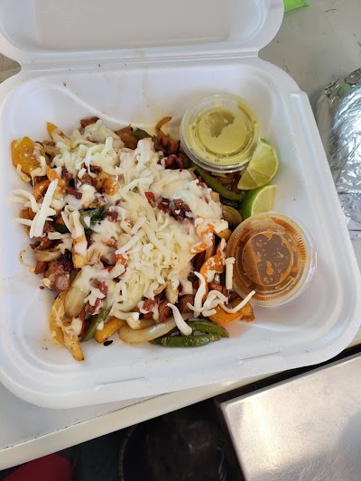 Tres Hermanos Tacos food truck in Manhattan